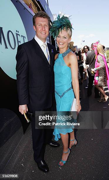 Host Peter Overton and his wife newsreader Jessica Rowe attend the Melbourne Cup Carnival's Derby Day in the Moet et Chandon marquee at Flemington...