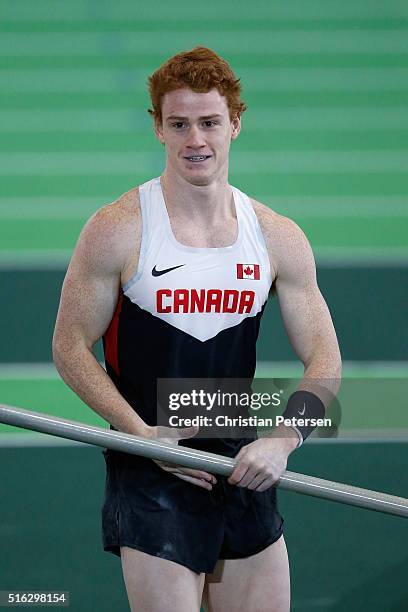 Shawnacy Barber of Canada competes in the Men's Pole Vault Final during day one of the IAAF World Indoor Championships at Oregon Convention Center on...