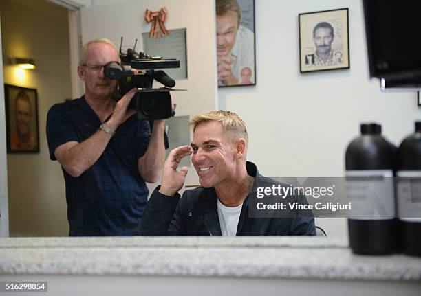 Shane Warne poses with his new hair look during a media opportunity at Advanced Hair Studio on March 18, 2016 in Melbourne, Australia. Shane Warne...