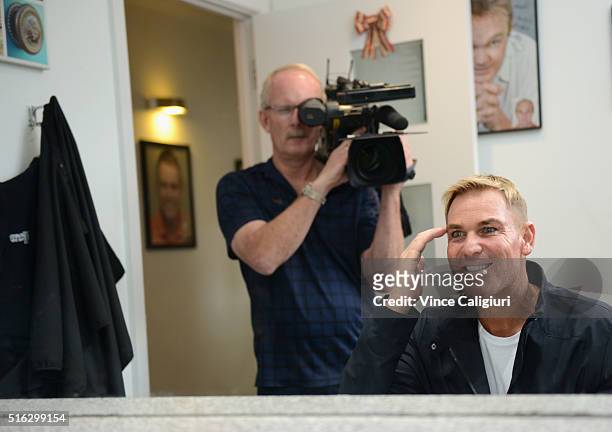 Shane Warne poses with his new hair look during a media opportunity at Advanced Hair Studio on March 18, 2016 in Melbourne, Australia. Shane Warne...