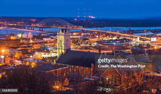 Historic downtown with the Cathedral of Saint Raphael in foreground and the Mississippi River in the background in Dubuque, Iowa on January 30, 2016....