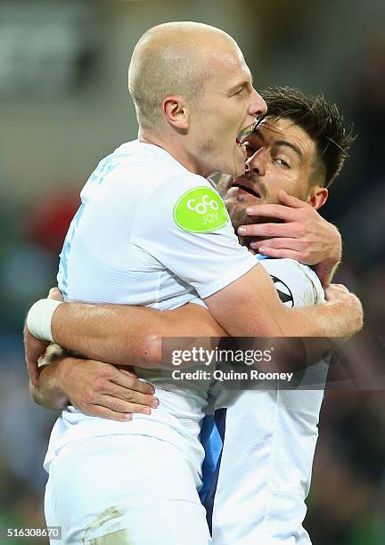 Aaron Mooy of City cis congratulated by Bruno Fornaroli after scoring a goal during the round 24 A-League match between Melbourne City and Brisbane...