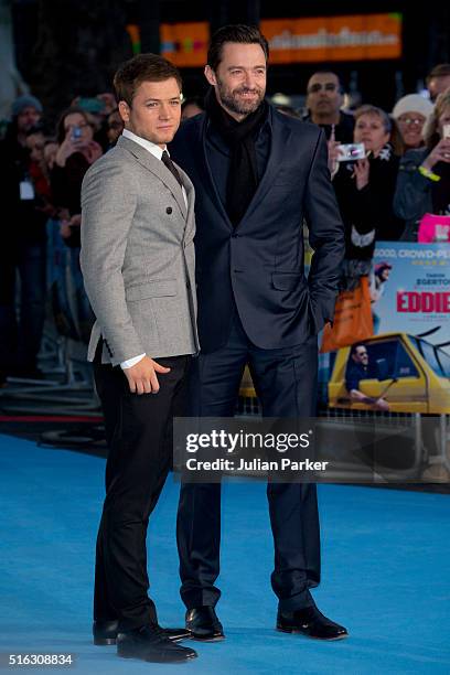Taron Egerton, and Hugh Jackman, arrive for the European premiere of 'Eddie The Eagle' at Odeon Leicester Square on March 17, 2016 in London,...