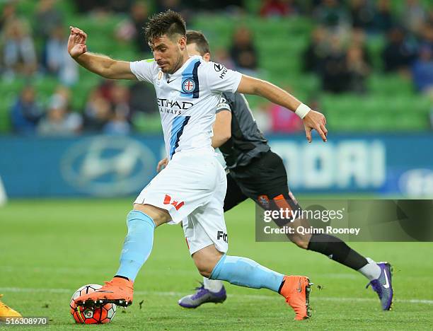 Bruno Fornaroli of City breaks through the Roar's defence during the round 24 A-League match between Melbourne City and Brisbane Roar at AAMI Park on...