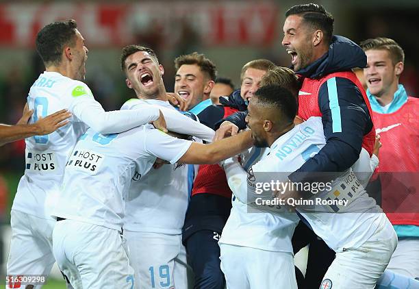 Melbourne City players celebrate a goal by Nick Fitzgerald during the round 24 A-League match between Melbourne City and Brisbane Roar at AAMI Park...