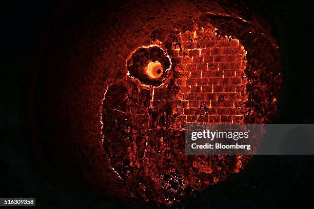 Furnace lining bricks glow red hot in a furnace at the ArcelorMittal steel plant in Zenica, Bosnia, on Thursday, March 17, 2016. Steel has become a...