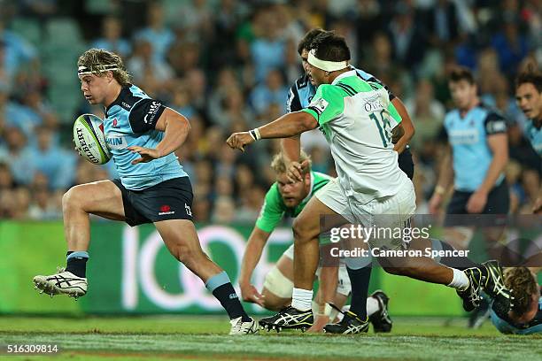 Hugh Roach of the Waratahs makes a break during the Super Rugby match between the New South Wales Waratahs and the Highlanders at Allianz Stadium on...