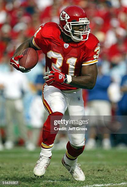 Running back Priest Holmes of the Kansas City Chiefs carries the ball in the first quarter against the Indianapolis Colts on October 31, 2004 at...