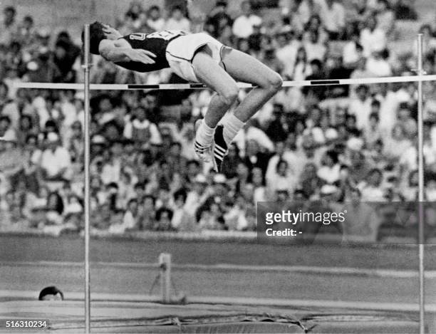 American athlete Dick Fosbury competes in the men's high jump final and wins the gold medal with a brand new style of jumping, on October 20 1968 at...
