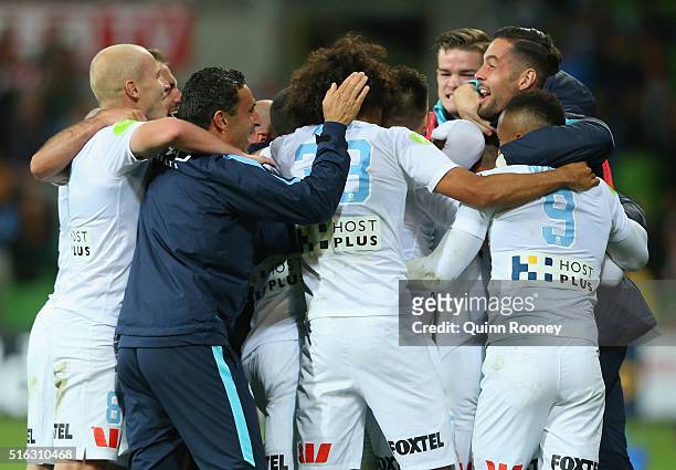 Melbourne City players celebrate a goal by Nick Fitzgerald during the round 24 A-League match between Melbourne City and Brisbane Roar at AAMI Park...