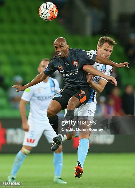 Henrique of the Roar and Alexander Wilkinson of City compete to head the ball during the round 24 A-League match between Melbourne City and Brisbane...