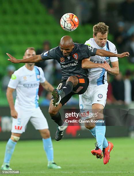 Henrique of the Roar and Alexander Wilkinson of City compete to head the ball during the round 24 A-League match between Melbourne City and Brisbane...