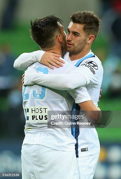 Bruno Fornaroli and Benjamin Garuccio of City celebrate winning the round 24 A-League match between Melbourne City and Brisbane Roar at AAMI Park on...