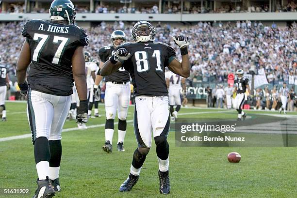 Wide Receiver Terrell Owens of the Philadelphia Eagles celebrates after scoring a touchdown in the fourth quarter against the Baltimore Ravens on...