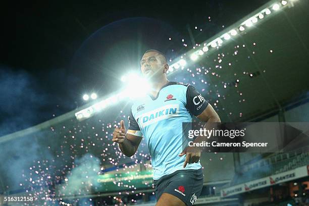 Kurtley Beale of the Waratahs runs onto the field during the Super Rugby match between the New South Wales Waratahs and the Highlanders at Allianz...