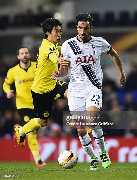 Nacer Chadli of Tottenham Hotspur battles with the ball with Shinji Kagawa of Borrussia Dortmund during the UEFA Europa League Round of 16 second leg...