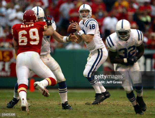 Quarterback Peyton Manning of the Indianapolis Colts drops back to pass against the Kansas City Chiefs on October 31, 2004 at Arrowhead Stadium in...