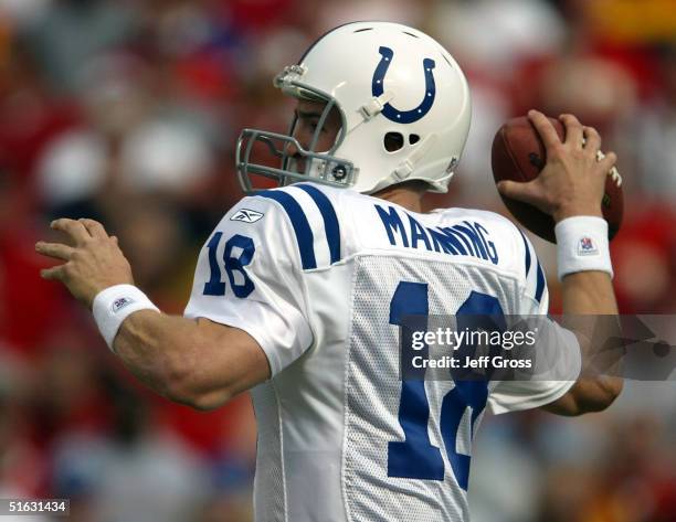Quarterback Peyton Manning of the Indianapolis Colts prepares to throw a pass against the Kansas City Chiefs on October 31, 2004 at Arrowhead Stadium...