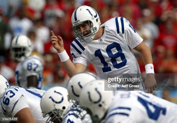 Quarterback Peyton Manning of the Indianapolis Colts calls out a play against the Kansas City Chiefs on October 31, 2004 at Arrowhead Stadium in...