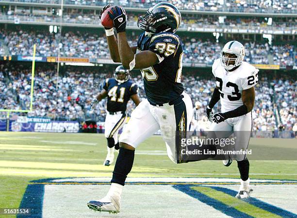 Tight end Antonio Gates of the San Diego Chargers catches the Chargers fifth touchdown of the game in the third quarter against the Oakland Raiders...