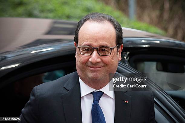 France's president Francois Hollande arrives at the Council of the European Union on the second day of an EU summit, on March 18, 2016 in Brussels,...