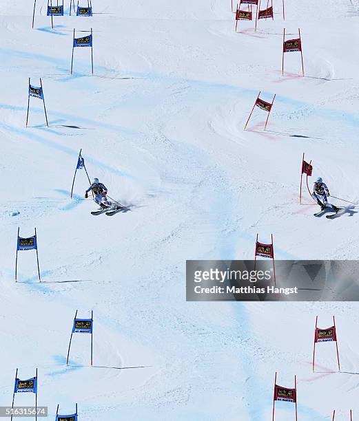 Dominik Stehle of Germany competes against Reto Schmidinger of Switzerland in the Final run during the Audi FIS Alpine Ski World Cup Finals Men's and...