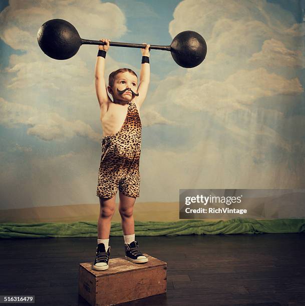 muskel-master - young kid and barbell stock-fotos und bilder