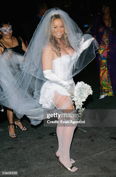 Singer Mariah Carey arrives at her Halloween party at Cain October 31, 2004 in New York City.