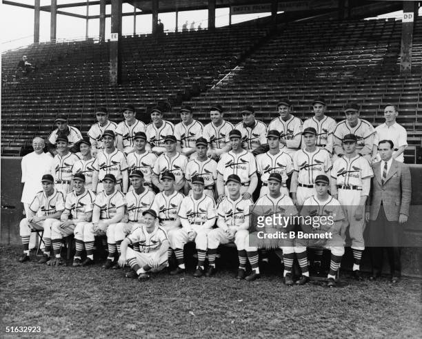 The 1942 St. Louis Cardinals pose for a team portrait, September 25, 1942. : Frank Crespi, Coaker Triplett, Ervin Dusak, Ray Sanders, Terry Moore,...