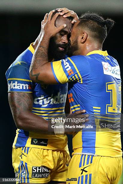 Semi Radradra of the Eels celebrates scoring a try with team mate Ken Edwards during the round three NRL match between the Canterbury Bulldogs and...