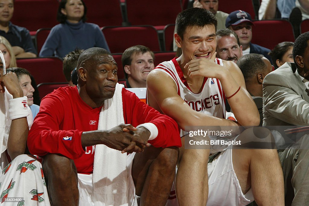 Mutamba Houston Rockets Yao Ming and Dikembe Mutombo of the Houston Rockets laugh on the ...