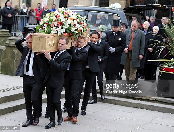 Coronation Street actors carry the coffin for the funeral of Coronation Street scriptwriter Tony Warren at Manchester Cathedral on March 18, 2016 in...
