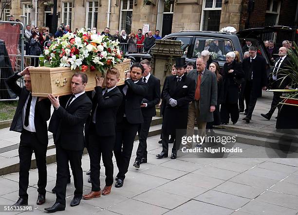 Coronation Street actors carry the coffin for the funeral of Coronation Street scriptwriter Tony Warren at Manchester Cathedral on March 18, 2016 in...