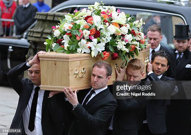 Coronation Street actors carry the coffin for the funeral of Coronation Street scriptwriter Tony Warren at Manchester Cathedral on March 18, 2016 in...