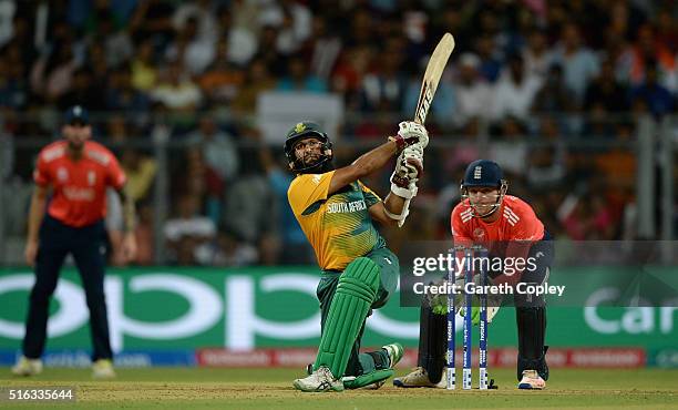 Hashim Amla of South Africa hits out for six runs during the ICC World Twenty20 India 2016 Super 10s Group 1 match between South Africa and England...