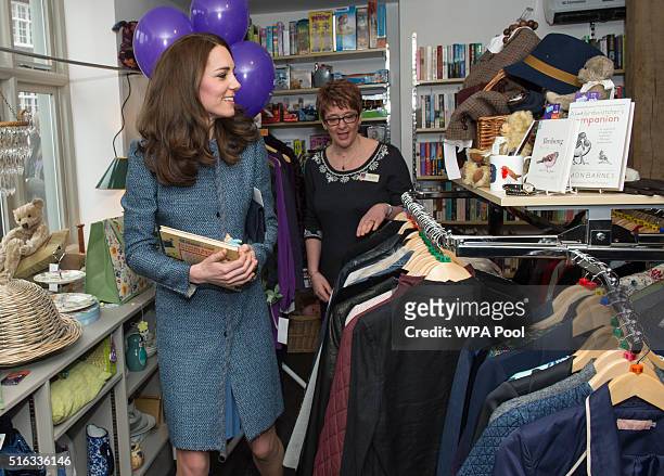 Catherine, Duchess of Cambridge takes a tour of the new EACH charity shop that she officially opened earlier today on March 18, 2016 in Holt, United...