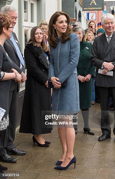 Catherine, Duchess of Cambridge arrives to officially open the new EACH charity shop on March 18, 2016 in Holt, United Kingdom.