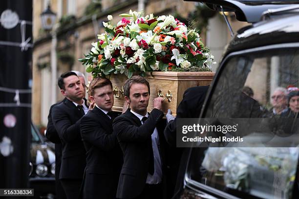 Coronation Street actors Jack Shepherd and Sam Aston carry the coffin after the funeral of Coronation Street scriptwriter Tony Warren at Manchester...