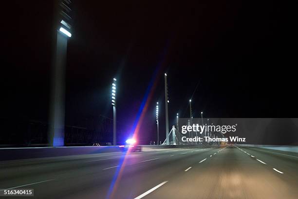 highway patrol on a freeway - highway patrol stock pictures, royalty-free photos & images