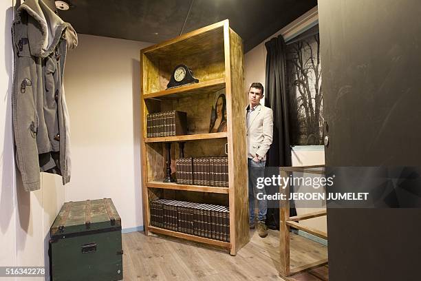 Owner Thijs Verberne poses in Valkenswaard, on March 18, 2016 at the Escape Bunker, replica of the place where Anne Frank and her family went into...