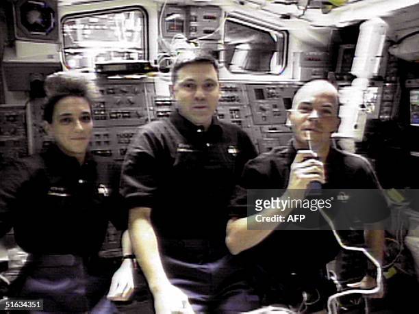 Space shuttle Endeavour crewmembers US Mission Specialist Nancy Currie, US Commander Bob Cabana and US Pilot Rick Sturckow answer questions about...