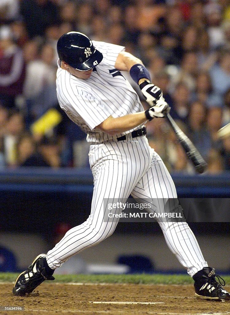 New York Yankees' rookie Shane Spencer hits a home