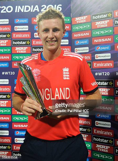Mumbai, INDIA Joe Root of England poses with the man of the match trophy after the ICC World Twenty20 India 2016 match between South Africa and...