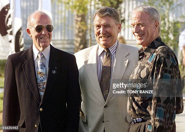 Mercury 7 astronauts Gordon Cooper , Wally Shirra and Scott Carpenter pose for the media 28 October during a press conference at Kennedy Space...