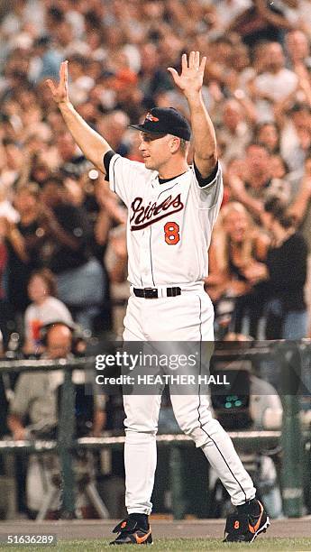 Baltimore Orioles third baseman, Cal Ripken Jr., acknowledges the applause of the crowd, 20 September at Camden Yards in Baltimore, MD. Ripken said...