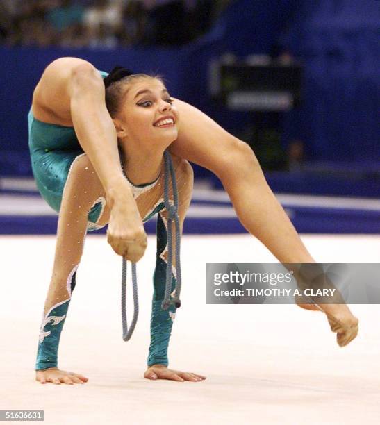 Alina Kabayeva of Russia performs her silver medal rope routine during the rhythmic gymnastic individual exercise final competition at the 1998...