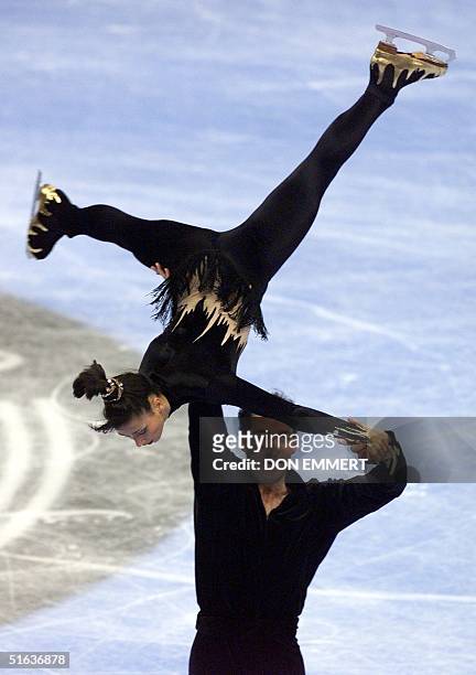French skater Sarah Abitbol is lifted in the air by Stephane Bernadis in the pairs competition of the Goodwill Games in Uniondale, NY 31 July. The...