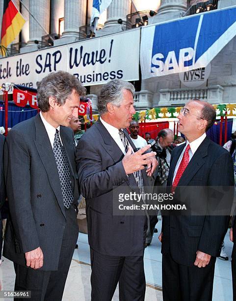 Co-chairmen Henning Kagermann and Hasso Plattner talk with New York Stock Exchange chairman Richard A. Grasso 03 August on Broad Steet in New York as...