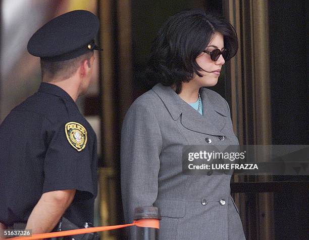 Monica Lewinsky leaves court 20 August after testifying before a grand jury investigating US President Clinton. Lewinsky testified for the second...