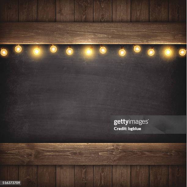 bildbanksillustrationer, clip art samt tecknat material och ikoner med christmas lights on wooden boards and chalkboard - wood